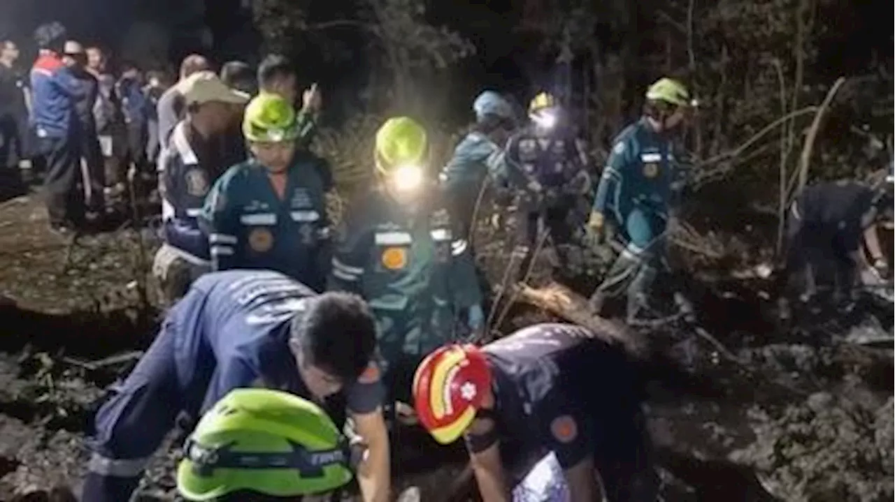 Rescuers work through the night at plane crash site in Thailand, with all 9 passengers believed dead