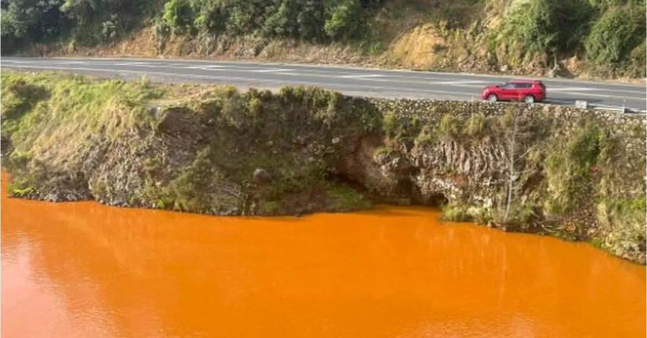 Council staff confirm old mine shaft cause of New Zealand river turning bright orange