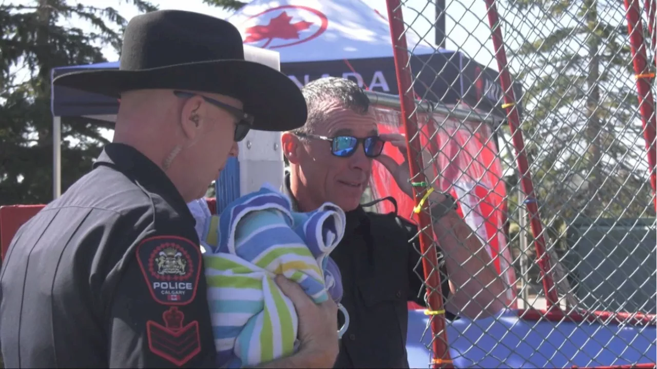 Calgary police chief gets dunked to help underpriviledged children enjoy the day of their lifetimes