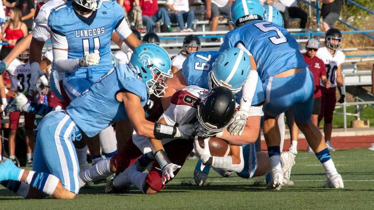 Late pick helps Northridge hold on to beat rival Layton in 23-14 win