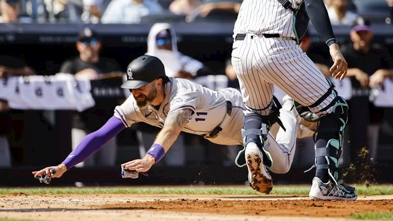 Cave drives in three runs as Rockies crush Yankees