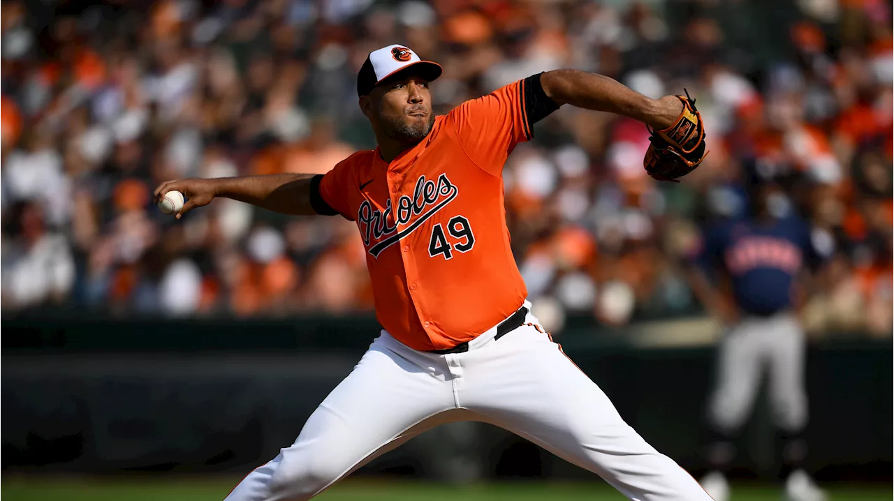 Holliday's bases-loaded double lifts Orioles to victory over Astros