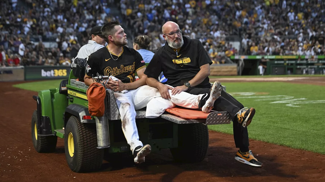 Pirates reliever Hunter Stratton carted off after injuring left leg while chasing a wild pitch