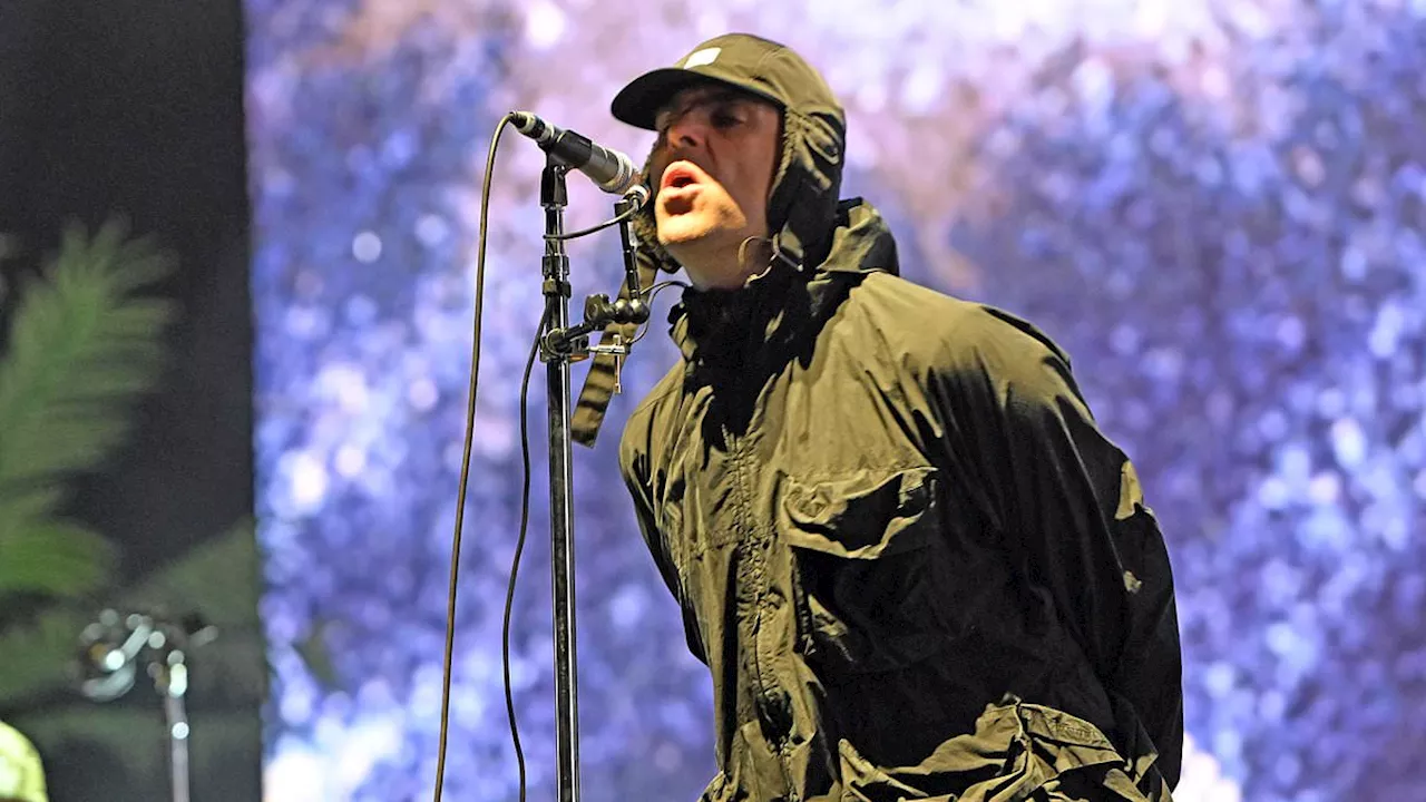 The late-night phone calls that ended 15-year Oasis feud: Liam Gallagher dedicates Reading headline...