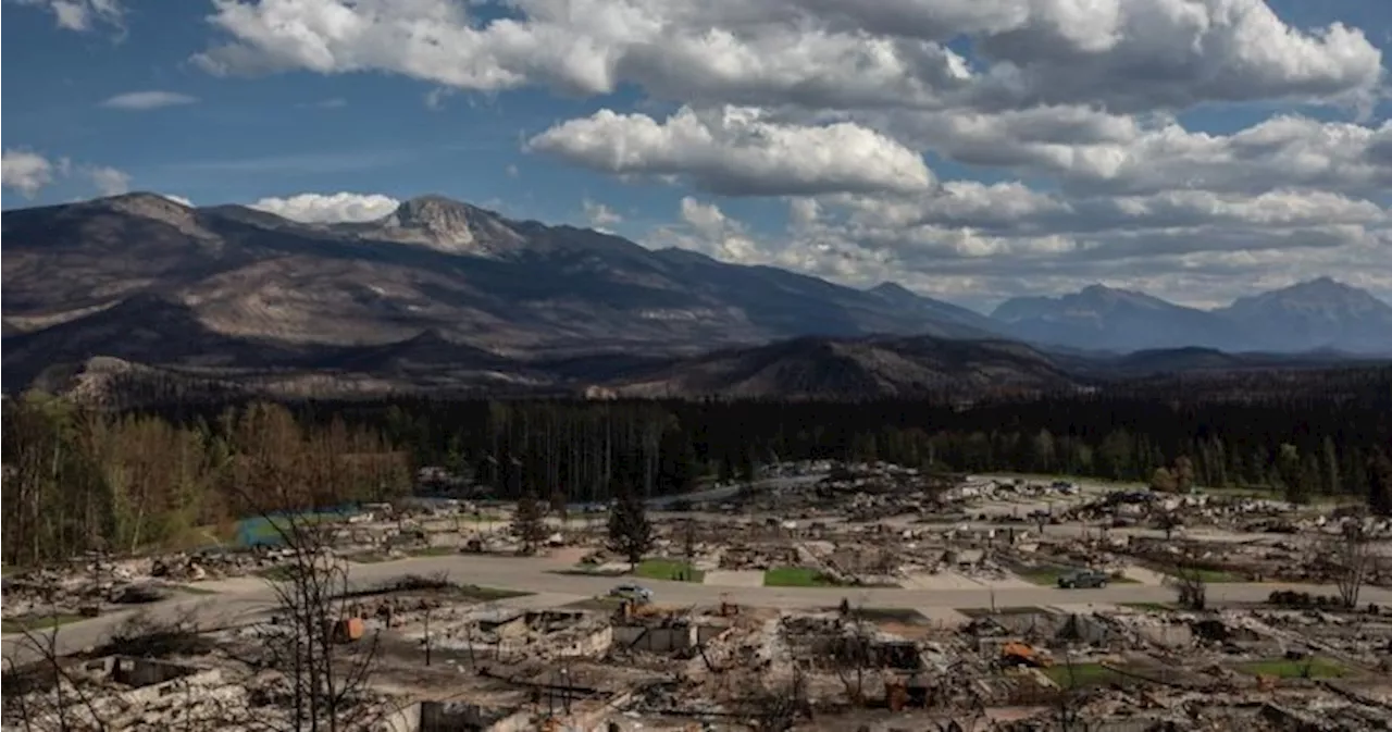 Downpour in Jasper National Park slows fires, but comes with warning