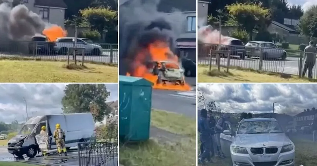 Chaotic scenes of vehicles ablaze and gardai patrol car almost hit after funeral