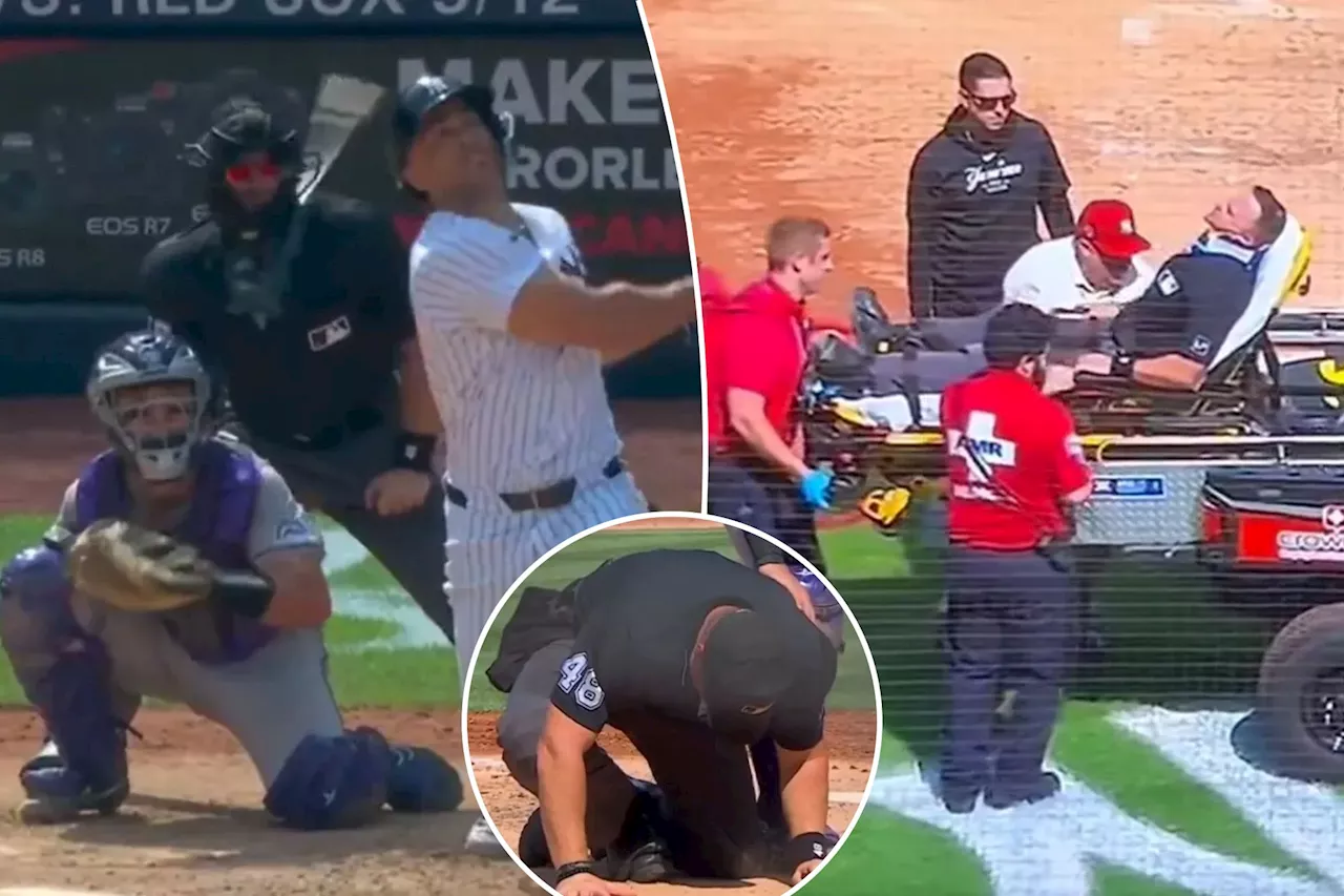 Umpire Nick Mahrley carted off after being hit by Giancarlo Stanton's broken bat in scary scene