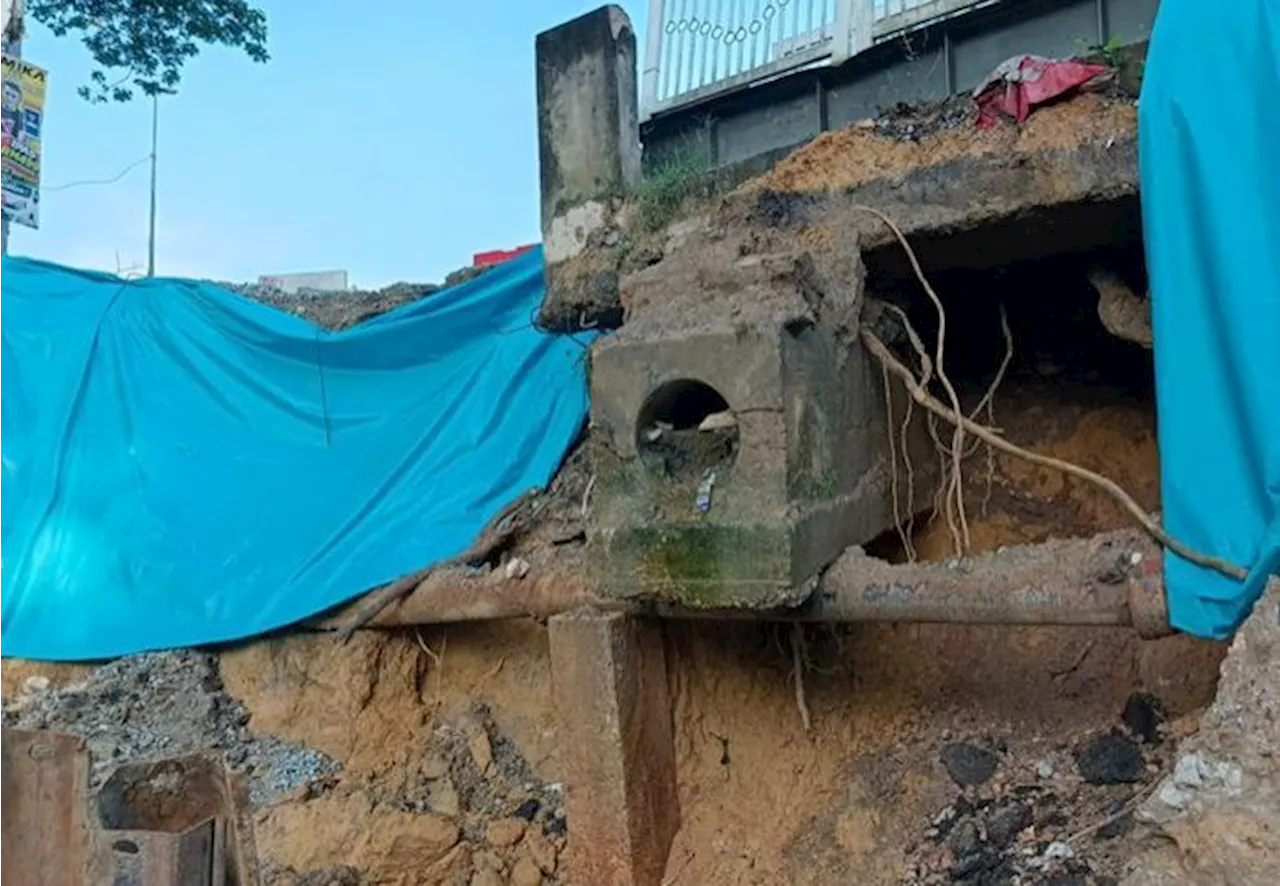 Ipoh road closed for repairs after land erosion incident