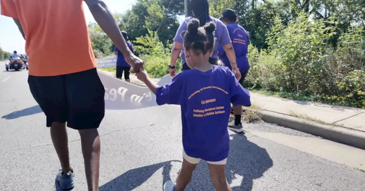 East side Indy neighbors hold walk to end youth gun violence