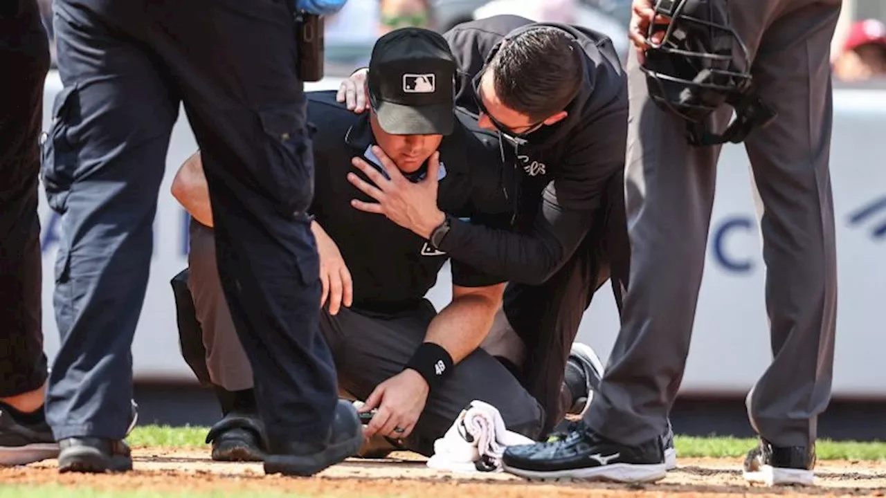 Umpire at Yankee Stadium taken off on a gurney after being struck by broken bat