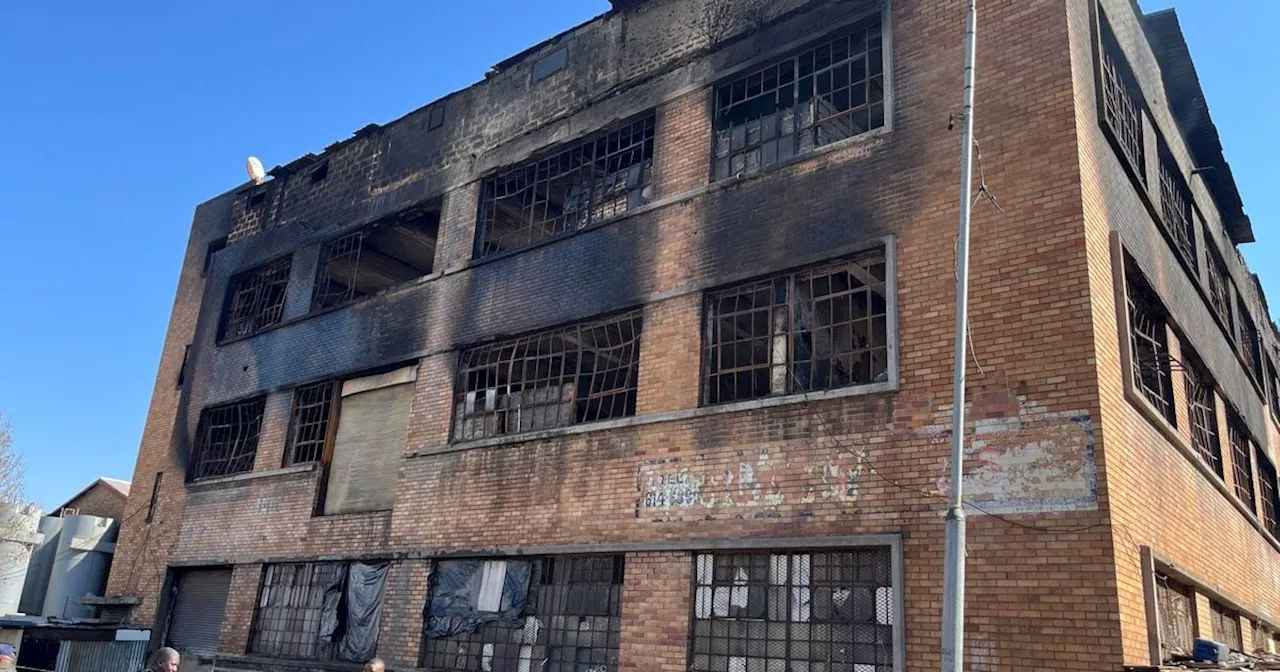 After deadly fire, homeless people salvage what they can from hijacked Jeppestown building