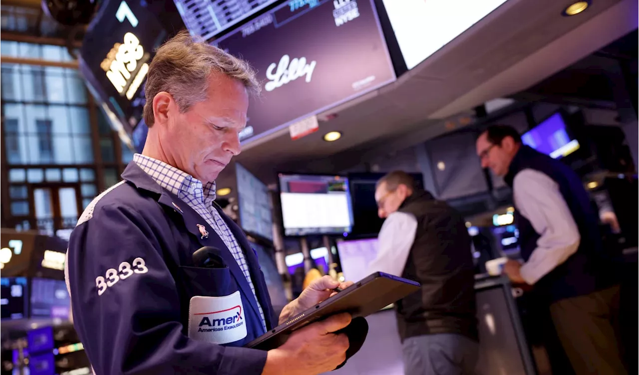 Stock futures edge lower after Dow's record close: Live updates