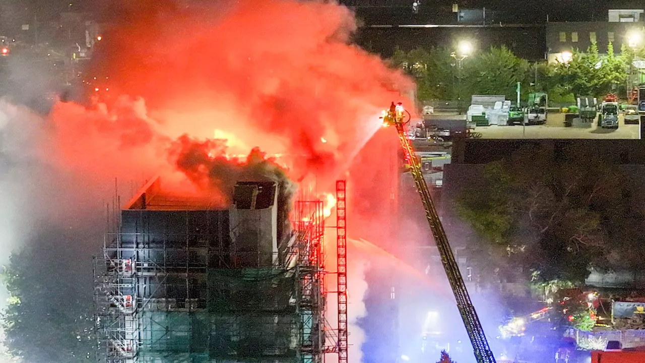 More than 200 firefighters respond to fire at east London tower block