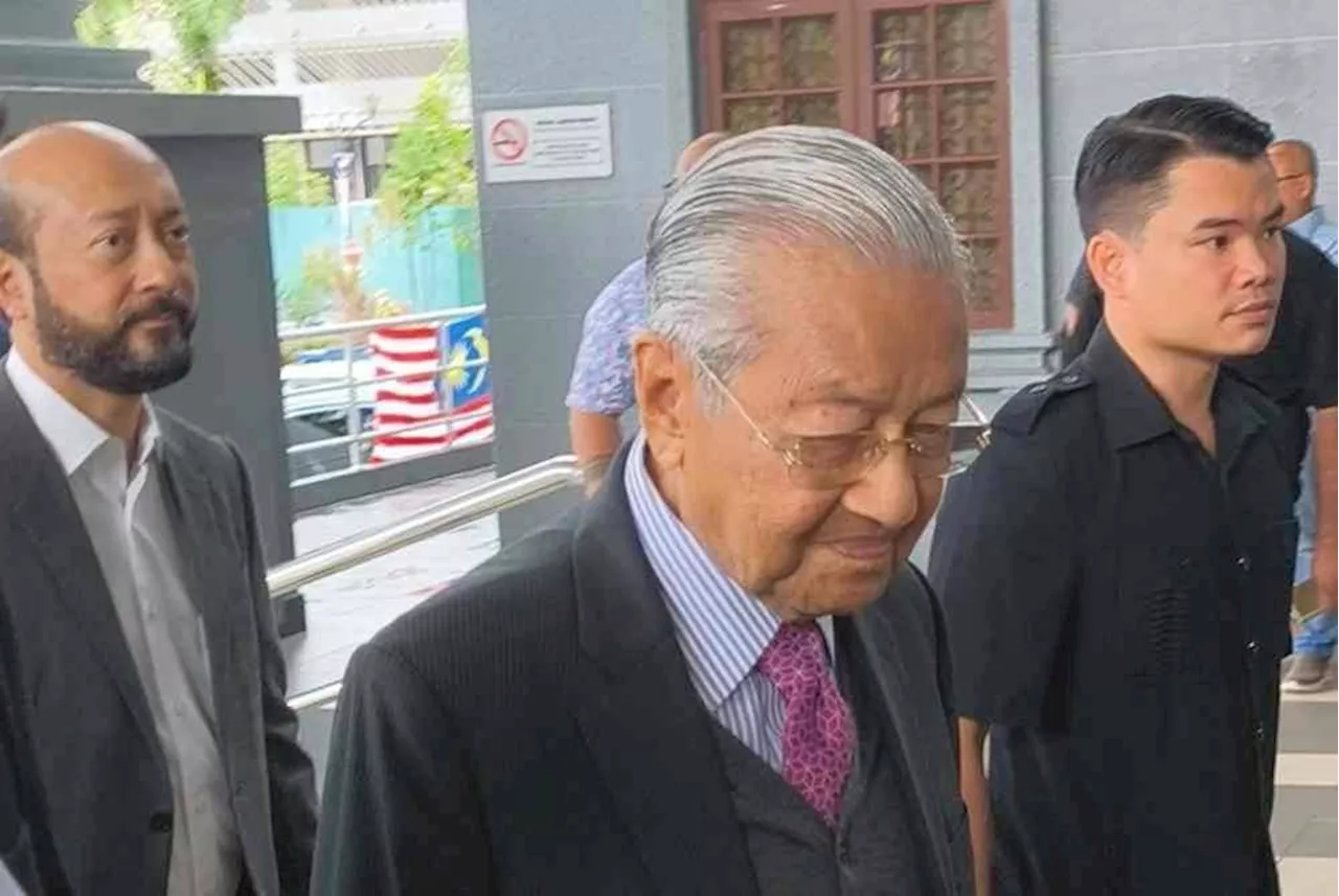 Dr M arrives in court for defamation suit against Zahid, expected to testify