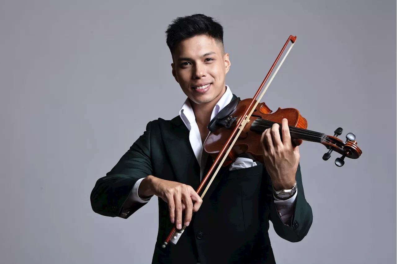 Violinist Martin Looi sets new Malaysia Book of Records with his performance at Menara KL