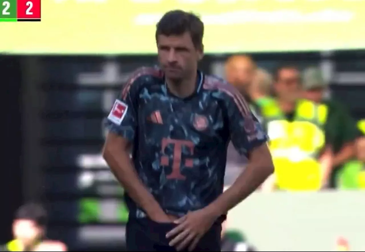 Thomas Muller bizarrely pulls Vincent Kompany’s instructions out of shorts during Bayern Munich’s comeback...