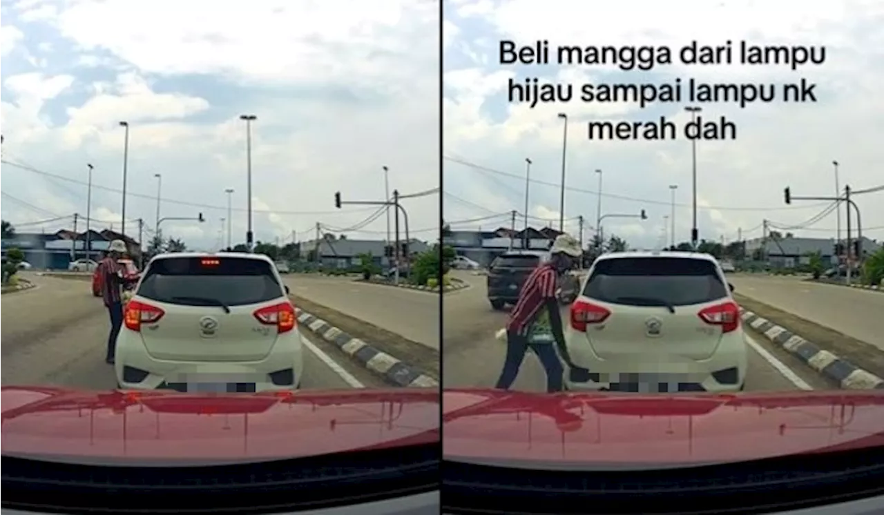 [Video] Pemandu Myvi Selamba Berhenti Di Lampu Isyarat Hijau Kerana Mahu Beli Dari Penjaja Jalanan