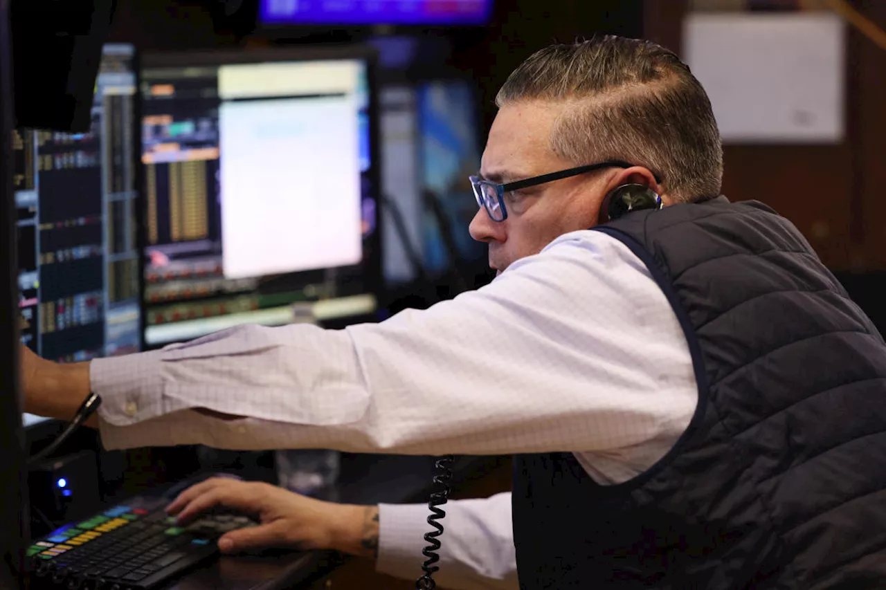 Stock market today: Dow closes at record high, S&P 500, Nasdaq slide as tech lags