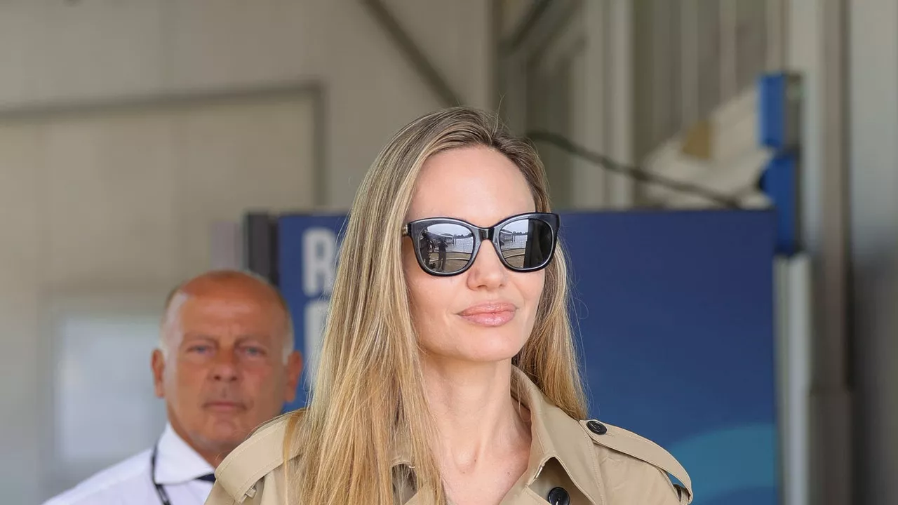 According To Angelina Jolie, Trench Coats Are For Summer