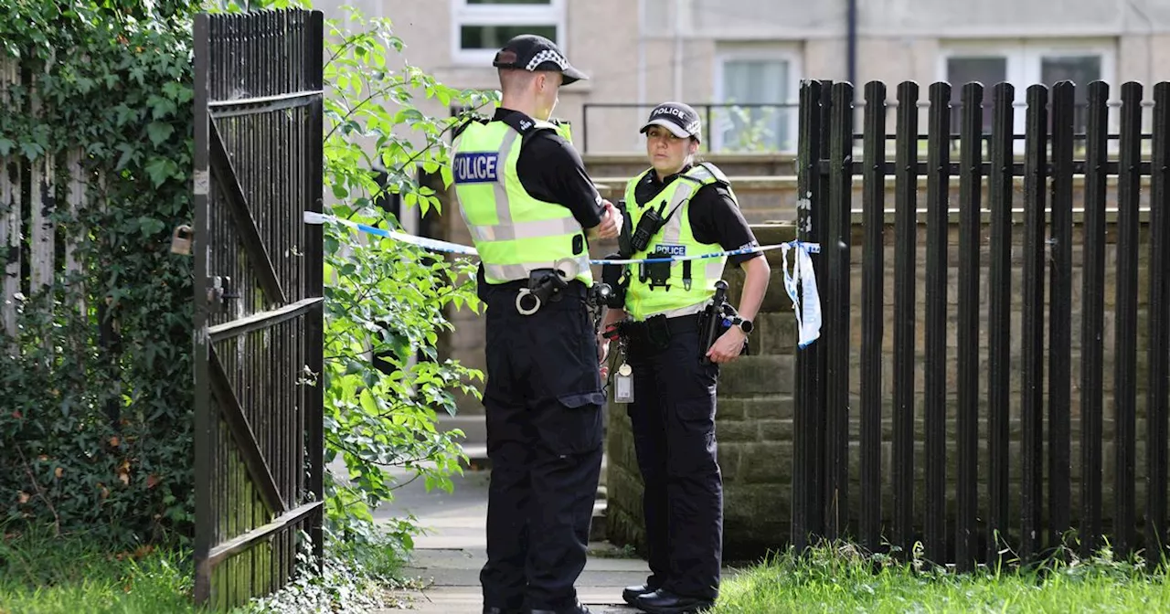 Murder probe launched after woman, 23, found dead at block of flats in Glasgow