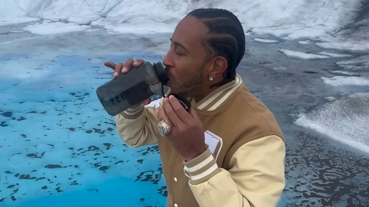 Ludacris baffles fans as he slides down Alaska glacier and drinks fresh water in bizarre video:...