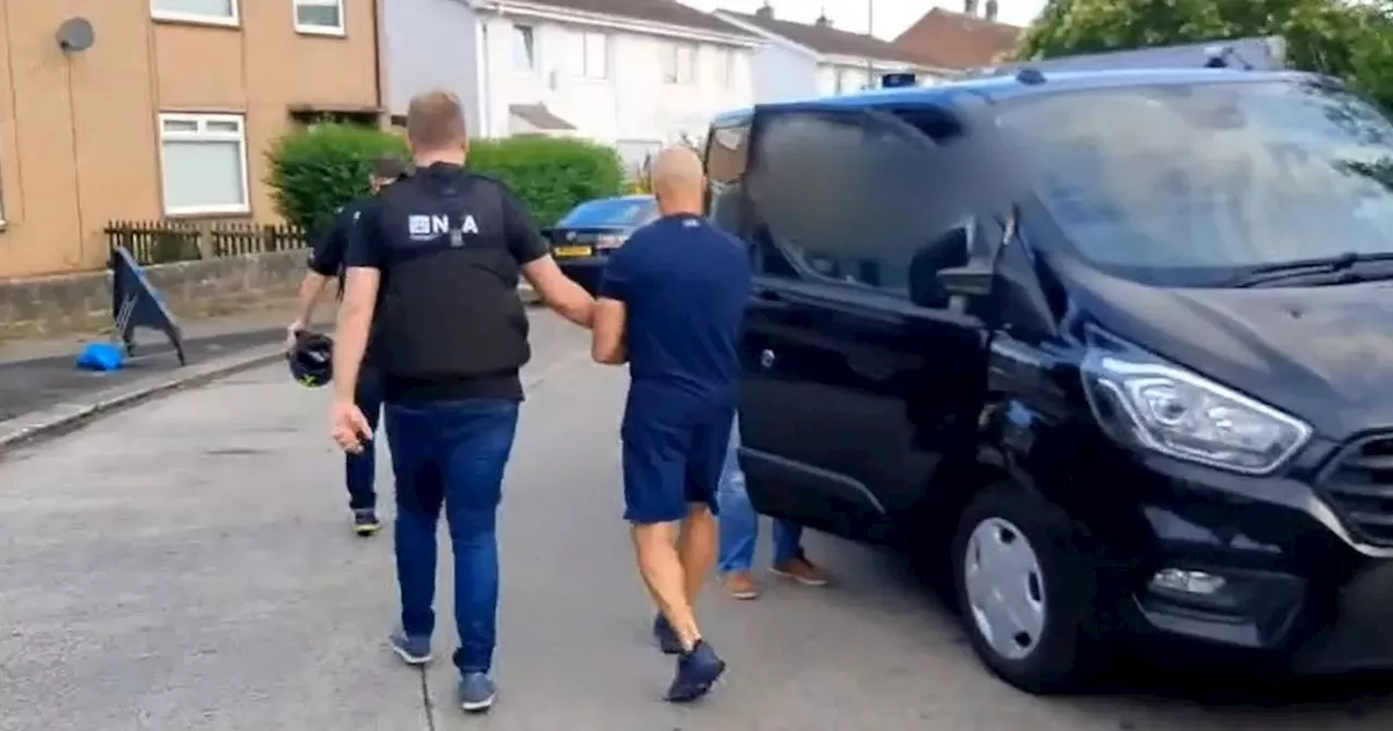 Moment topless Curtis Warren arrested at home