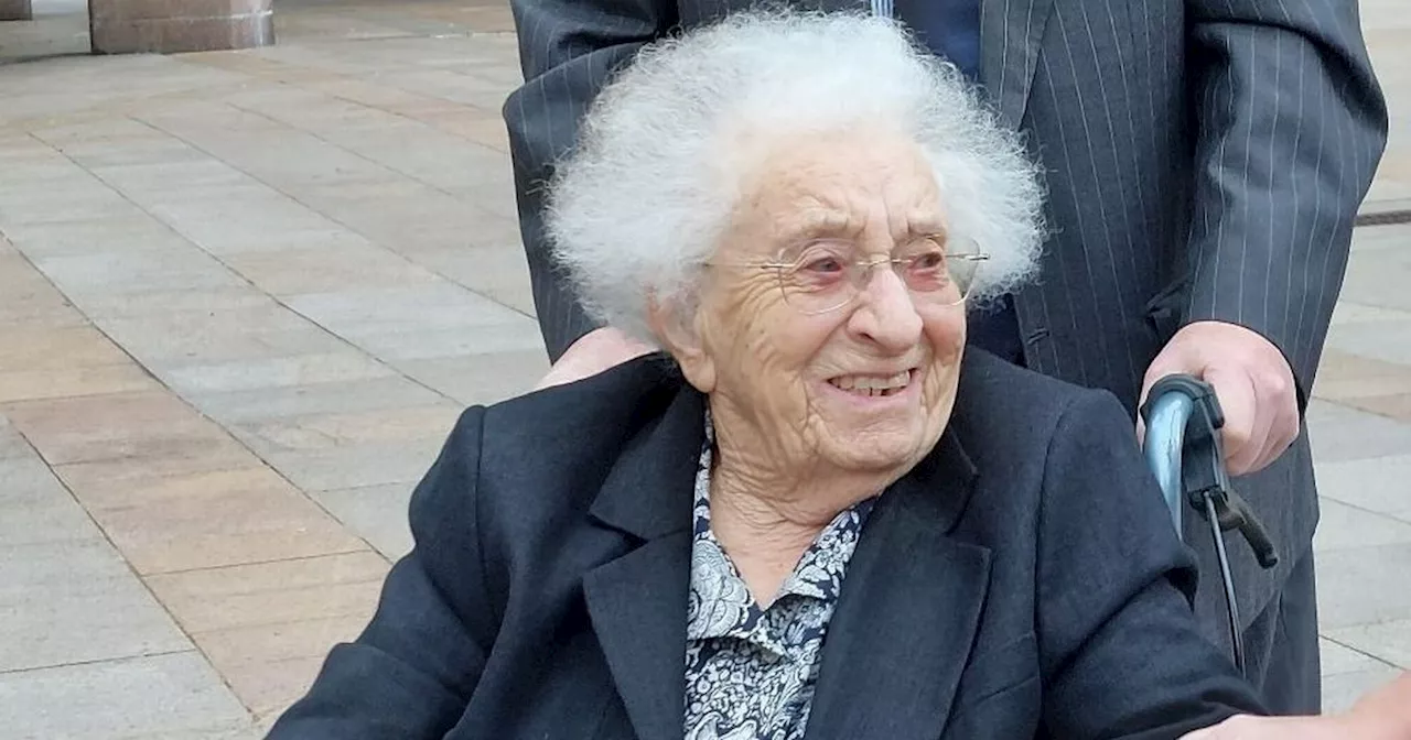 Woman, 96, clutches tissue and purse as she admits killing pedestrian in her car