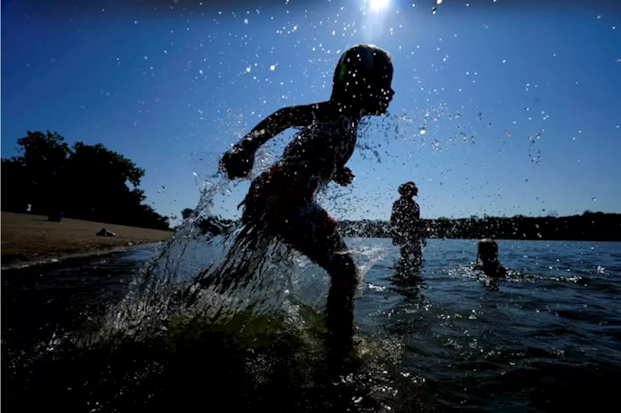 Wild week of US weather includes heat wave, tropical storm, landslide