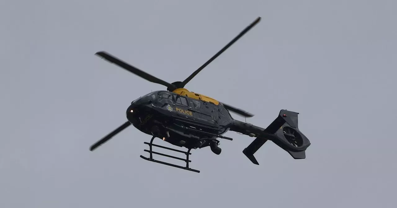 Police helicopter hunts man in Leeds after two officers injured in car chase