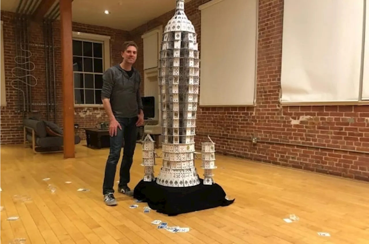 This US architect has broken the world record for the tallest house of cards built in eight hours