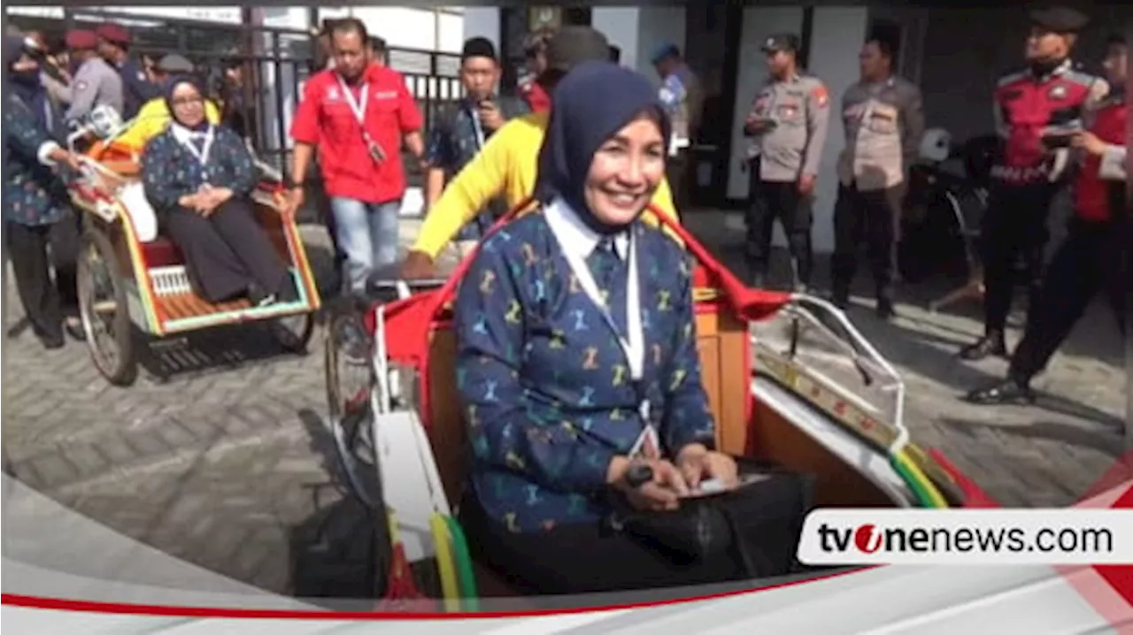 Naik Bentor Diiringi Kesenian Tradisional, Pasangan Calon Bunda Ita dan Mbak Zuli Mendaftar ke KPU Nganjuk