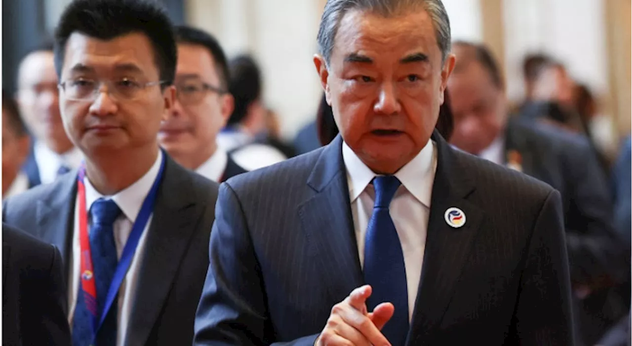 China FM Wang Yi warns visiting US envoy over Philippines