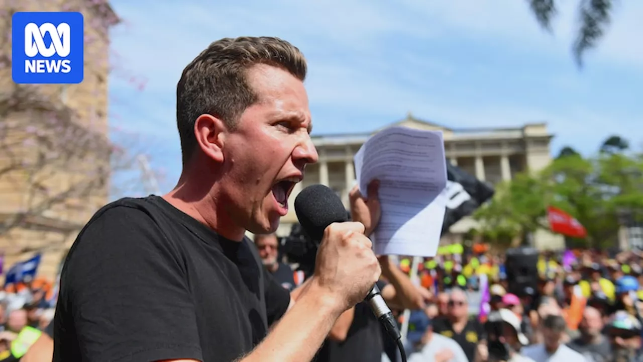 Greens leader defends MP's CFMEU rally attendance but says Nazi sign 'offensive'