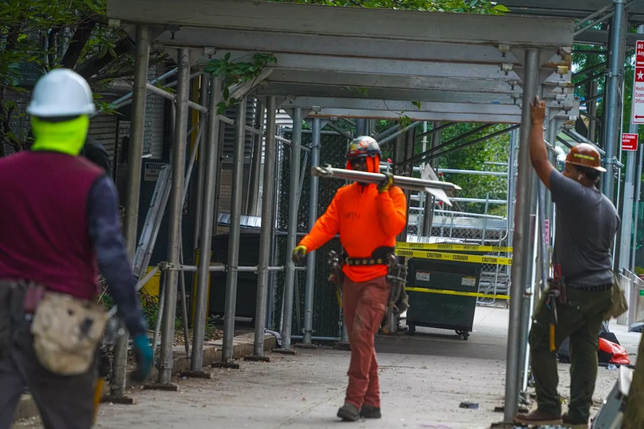 Goodbye, shed! NYC finally taking down rotting scaffold outside Medical Examiner's office