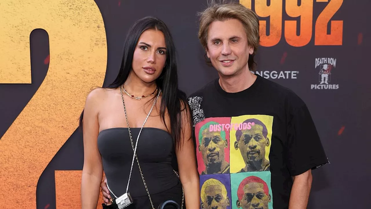 Jonathan Cheban of Keeping Up With The Kardashians fame poses with a stunning Kim Kardashian...