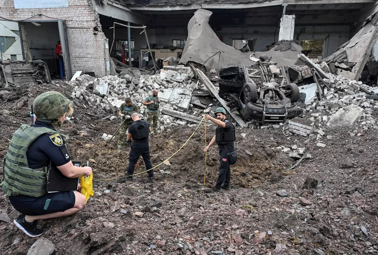 Russian missile strikes Ukrainian city already in mourning for deaths in earlier attack