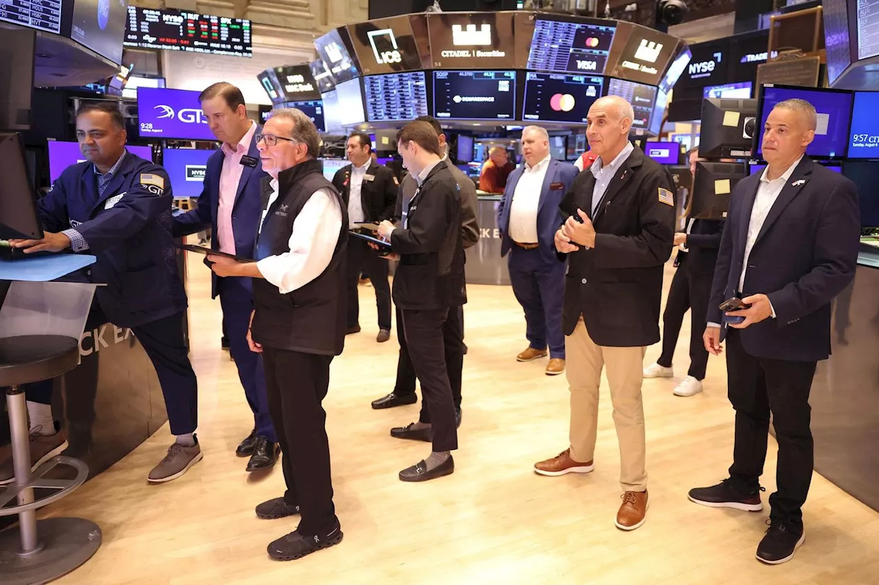 Wall Street termine en hausse, nouveau record pour le Dow Jones