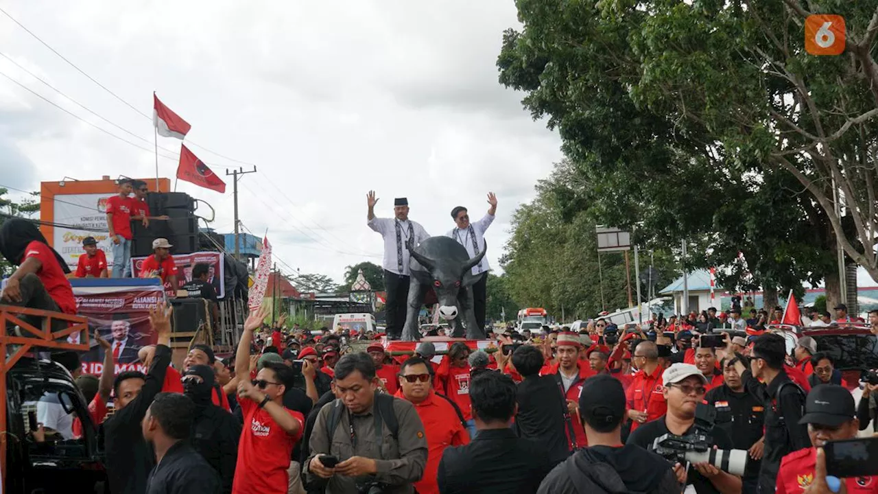 Diiringi Banteng Hitam, Pasangan Edi-Rendi Mendaftarkan Diri ke KPU Kutai Kartanegara