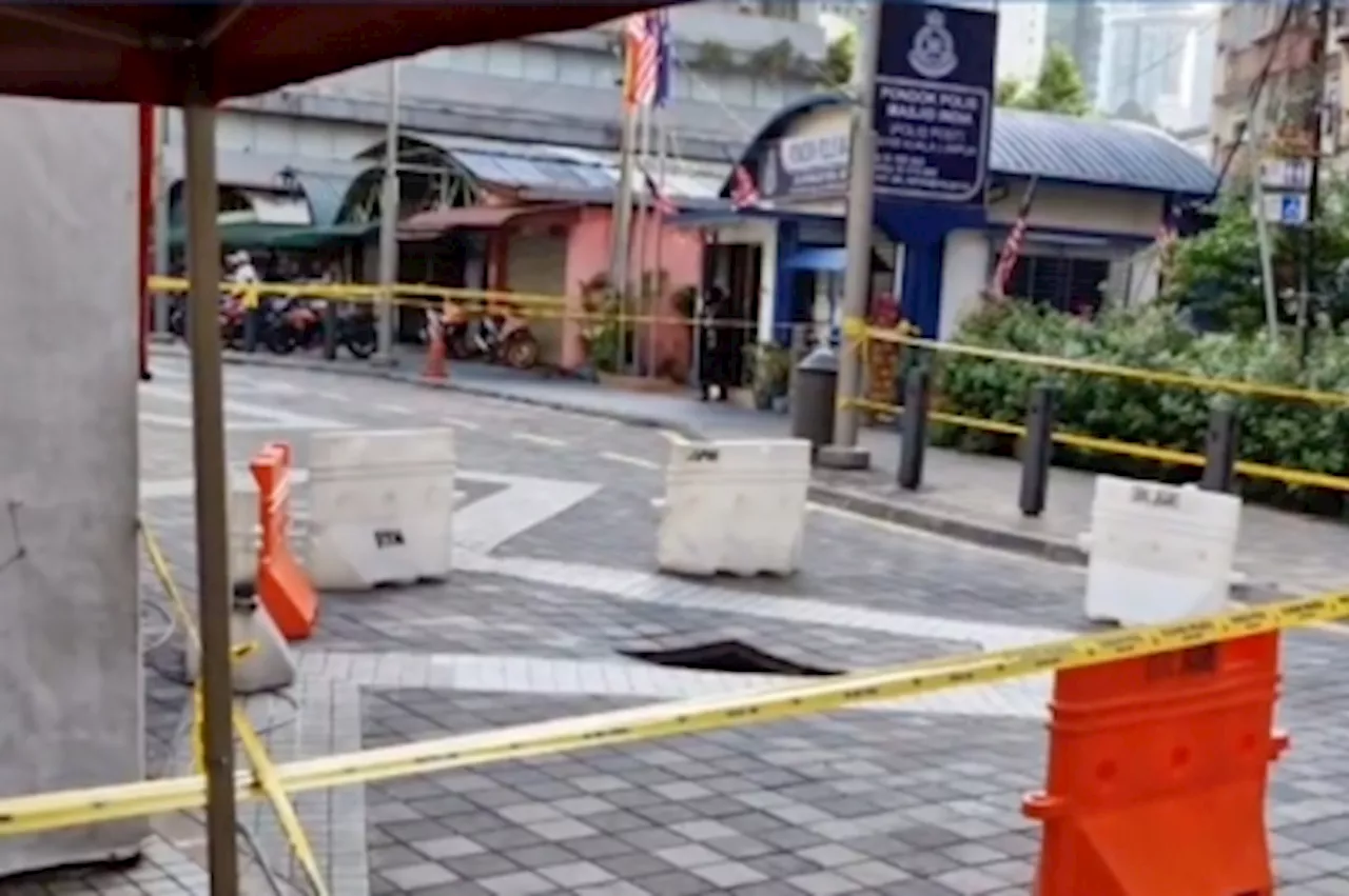 Another sinkhole appears at Jln Masjid India, mere 50m away from collapse which swallowed woman (VIDEO)