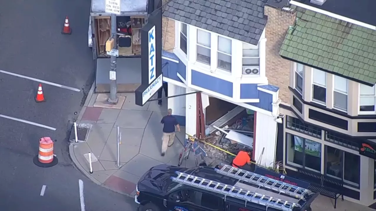 Video: Vehicle crashes through wall of Delco pharmacy