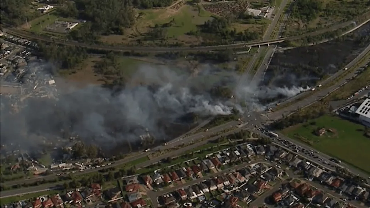 ‘Too late to leave’: Dire warning as grassfire spreads in southwest Sydney