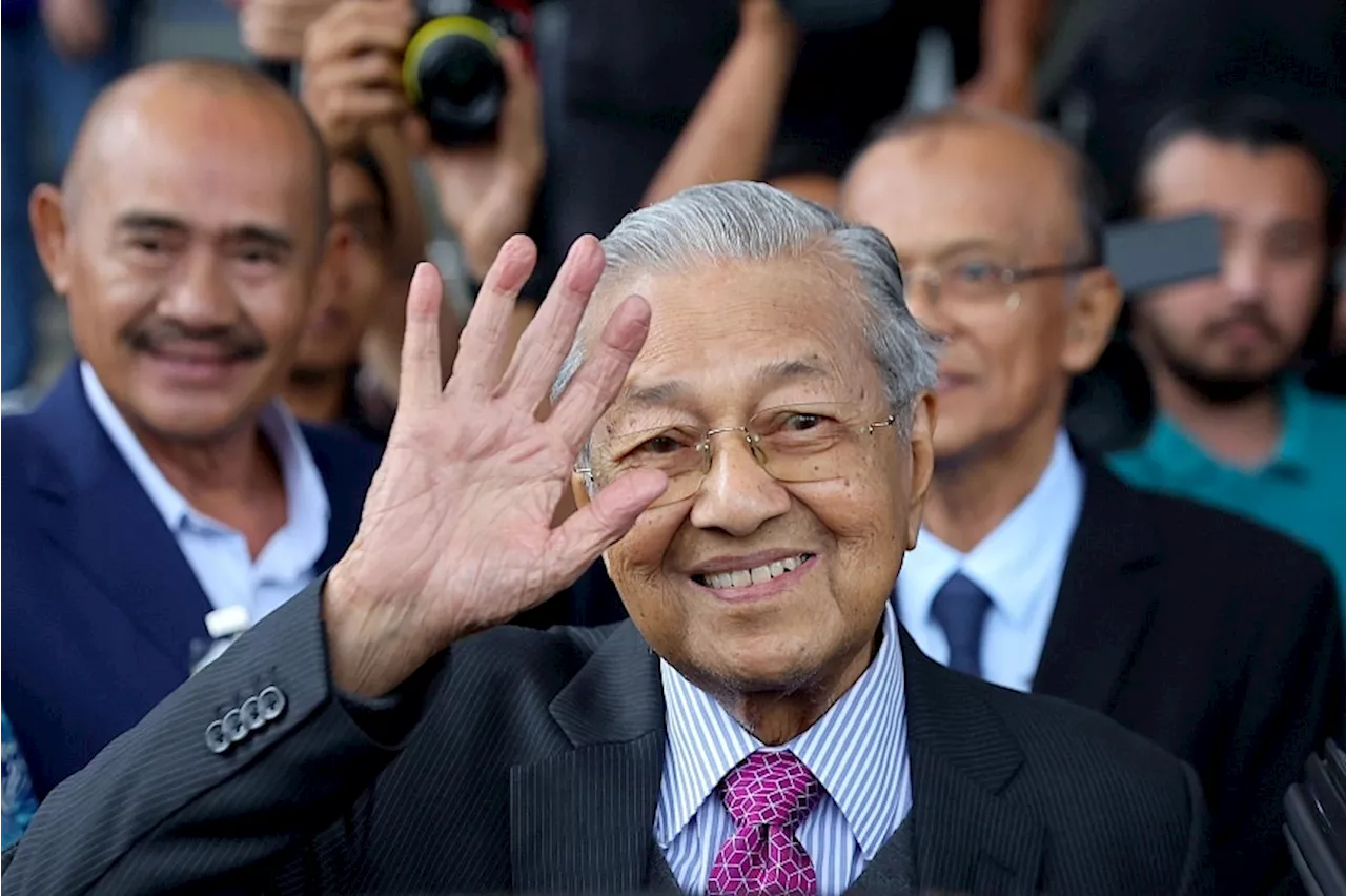 ‘Me, I am still alive’: Mahathir draws laughs when asked in court which of his siblings are alive