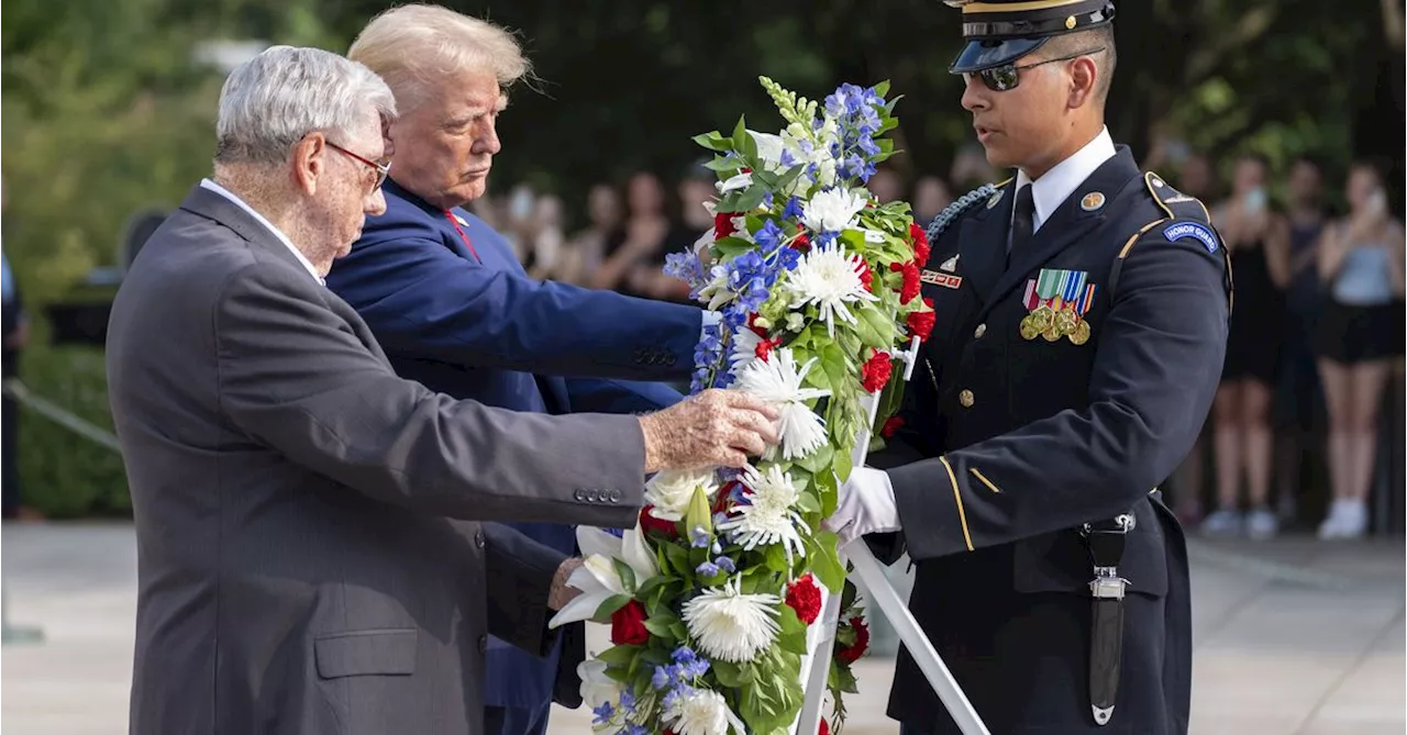 Trump campaign staff warned about photos at veterans' cemetery, official says