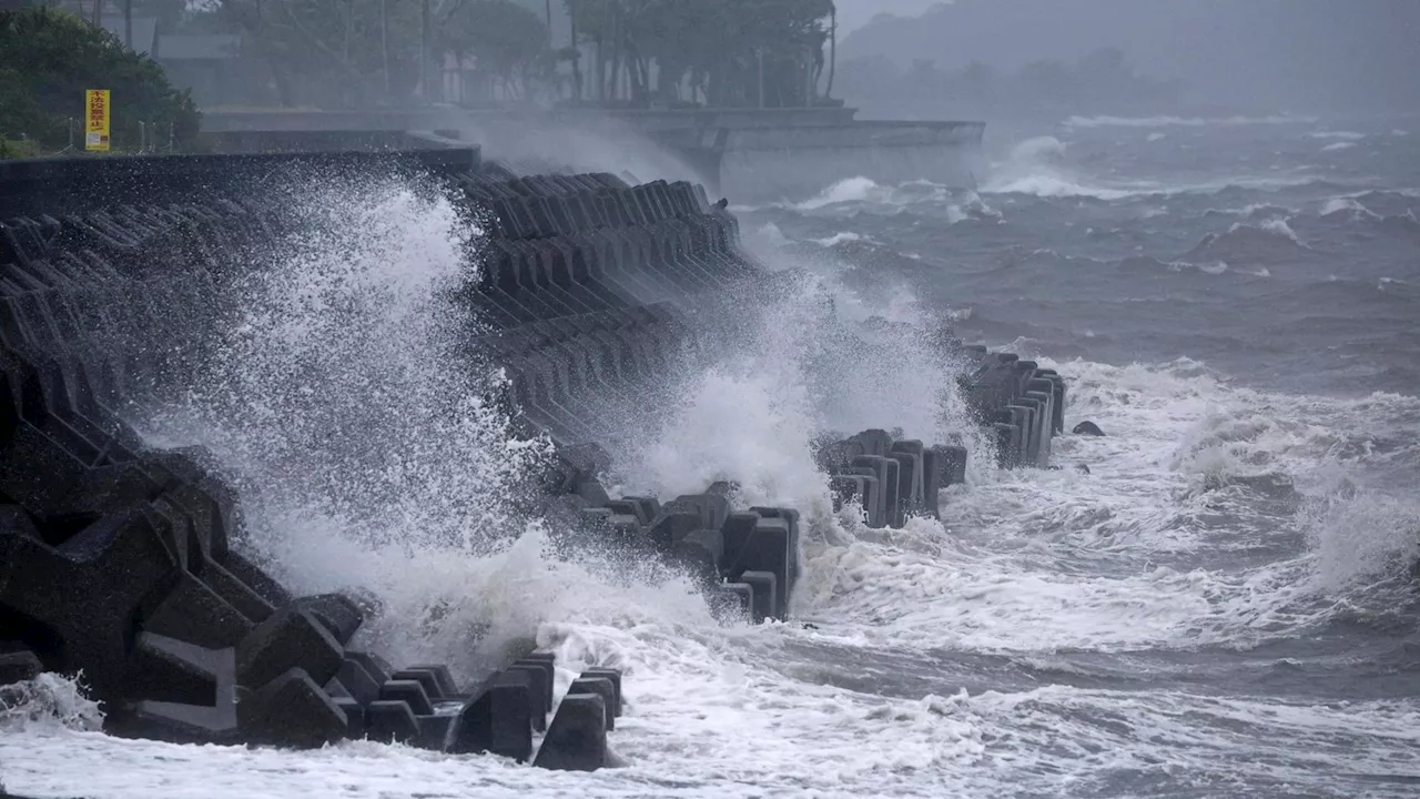 Typhoon lashes Japan with torrential rain and strong winds on a slow crawl north