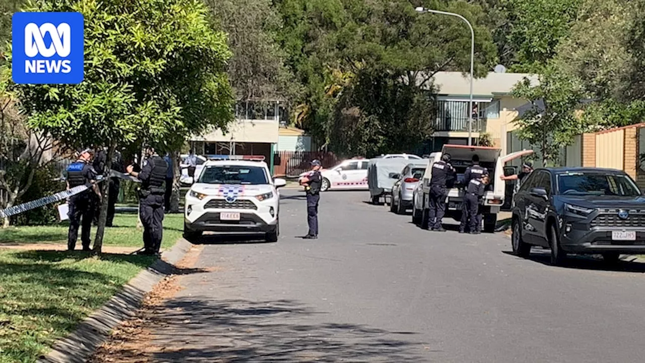 Man charged with two counts of murder after two people found dead at house in Mitchelton