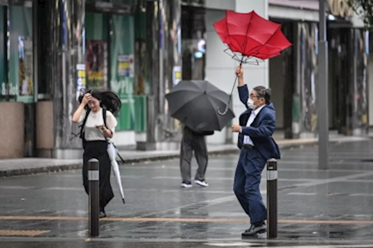 Typhoon Shanshan hits southern Japan, authorities issue warning as power outages affect thousands