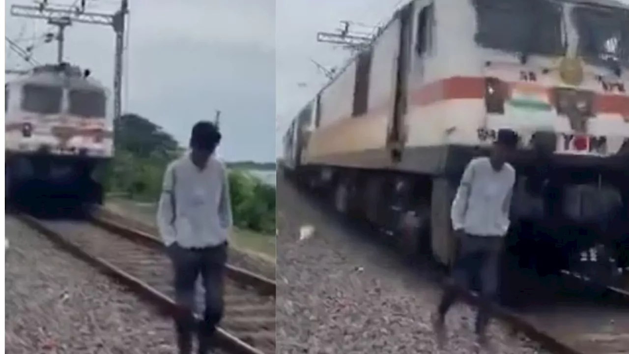 Viral Video : रील के चक्कर में ट्रेन की चपेट में आया युवक, दिल दहला देगा ये वीडियो