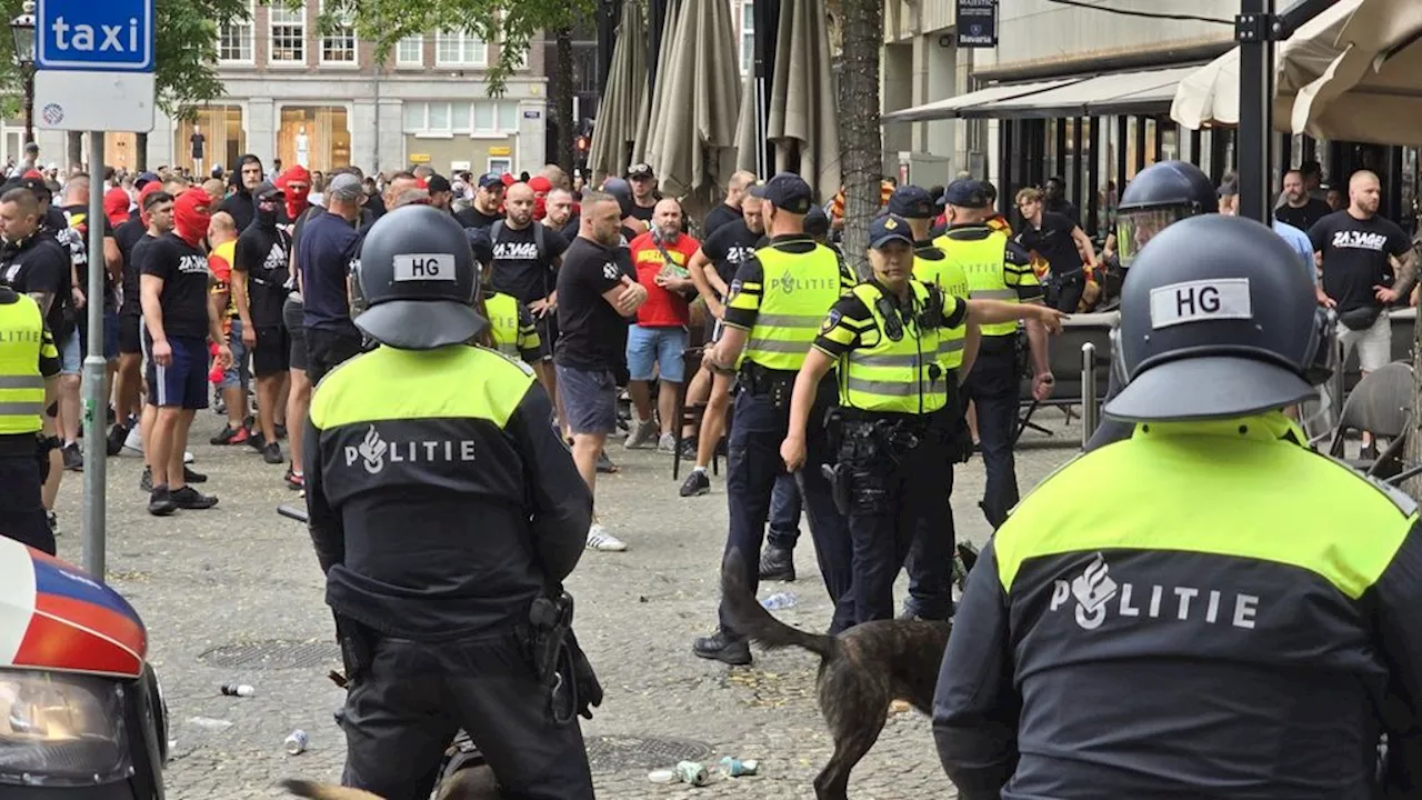 Drie agenten gewond bij confrontatie met Poolse voetbalsupporters op de Dam