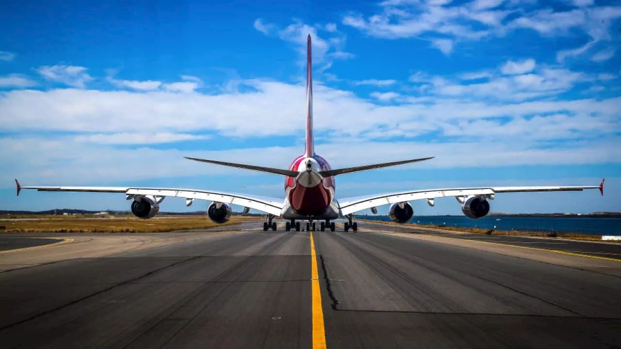 Air passengers can expect 'a new normal' as Qantas posts dip in profits