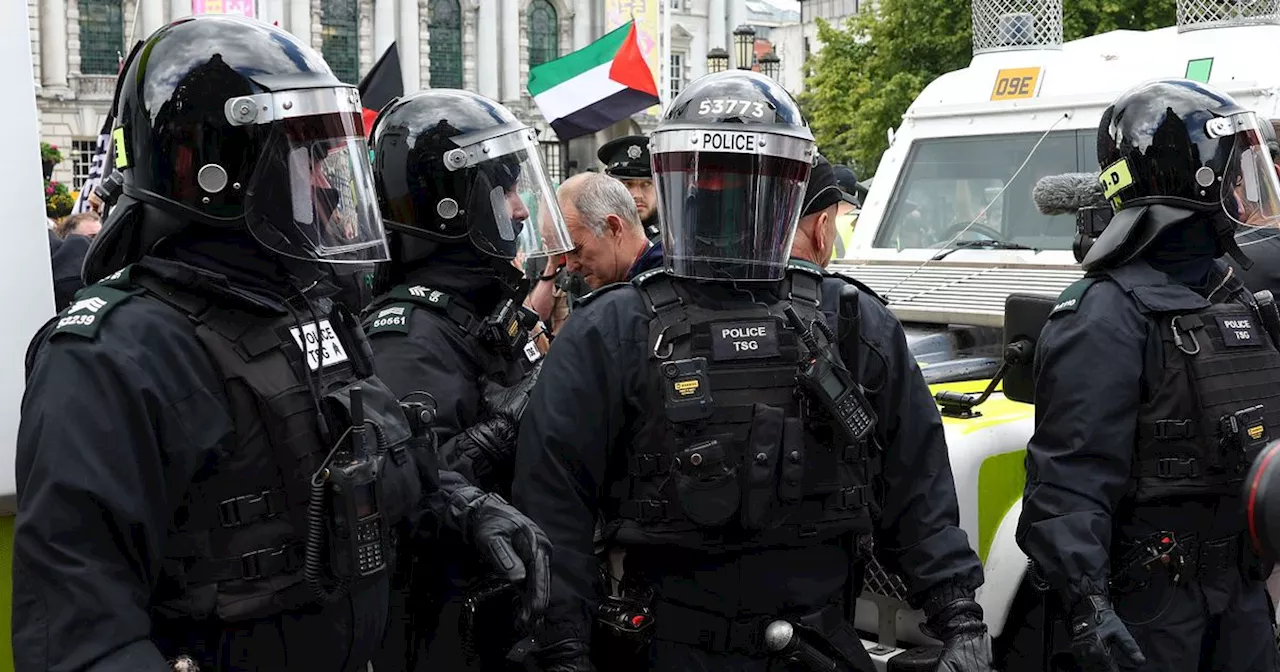 In pictures: Riot police deployed in Belfast as protests turn violent